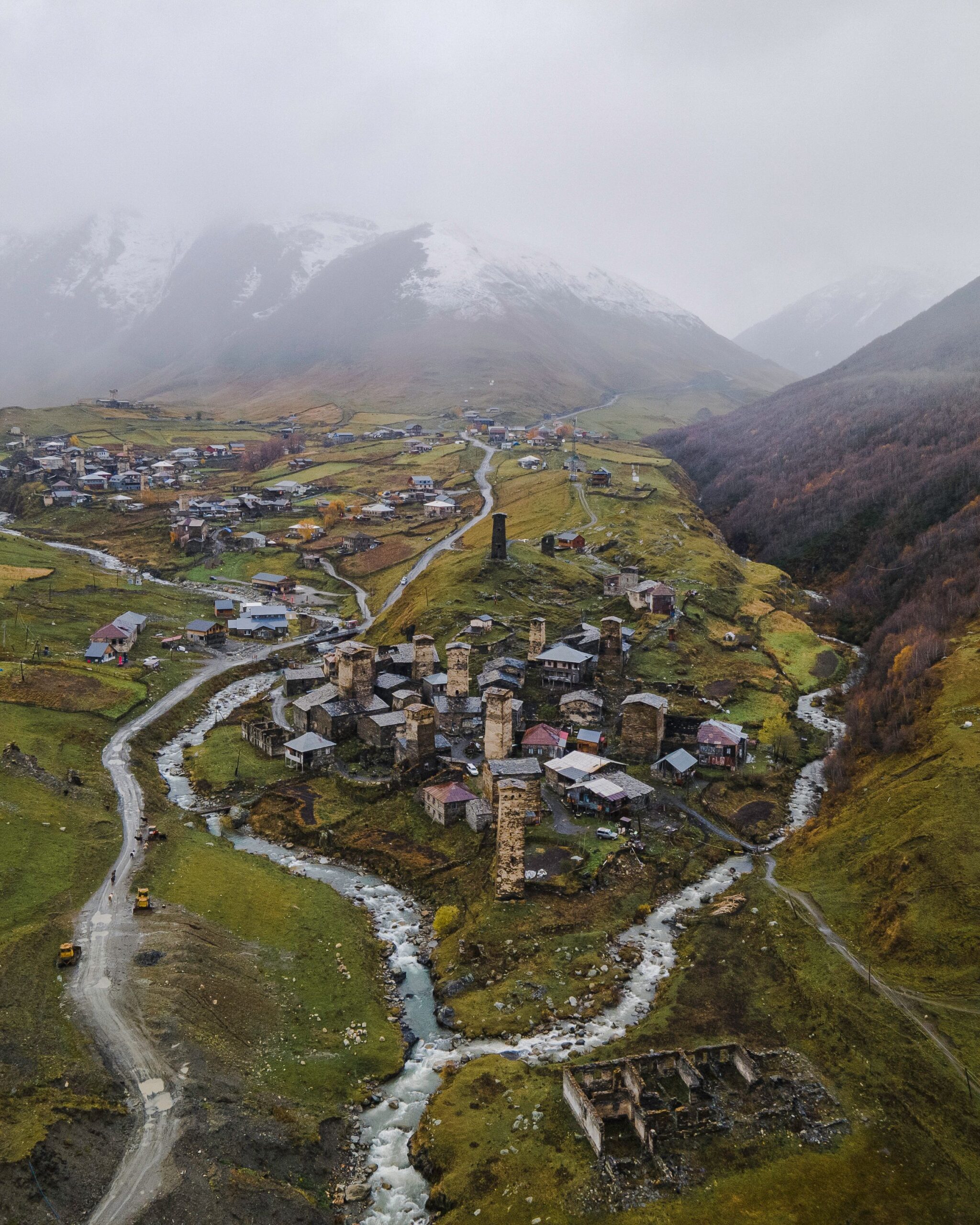Aerial shot of the picturesque village of Ushguli, nestled in the Caucasus mountains of Georgia.